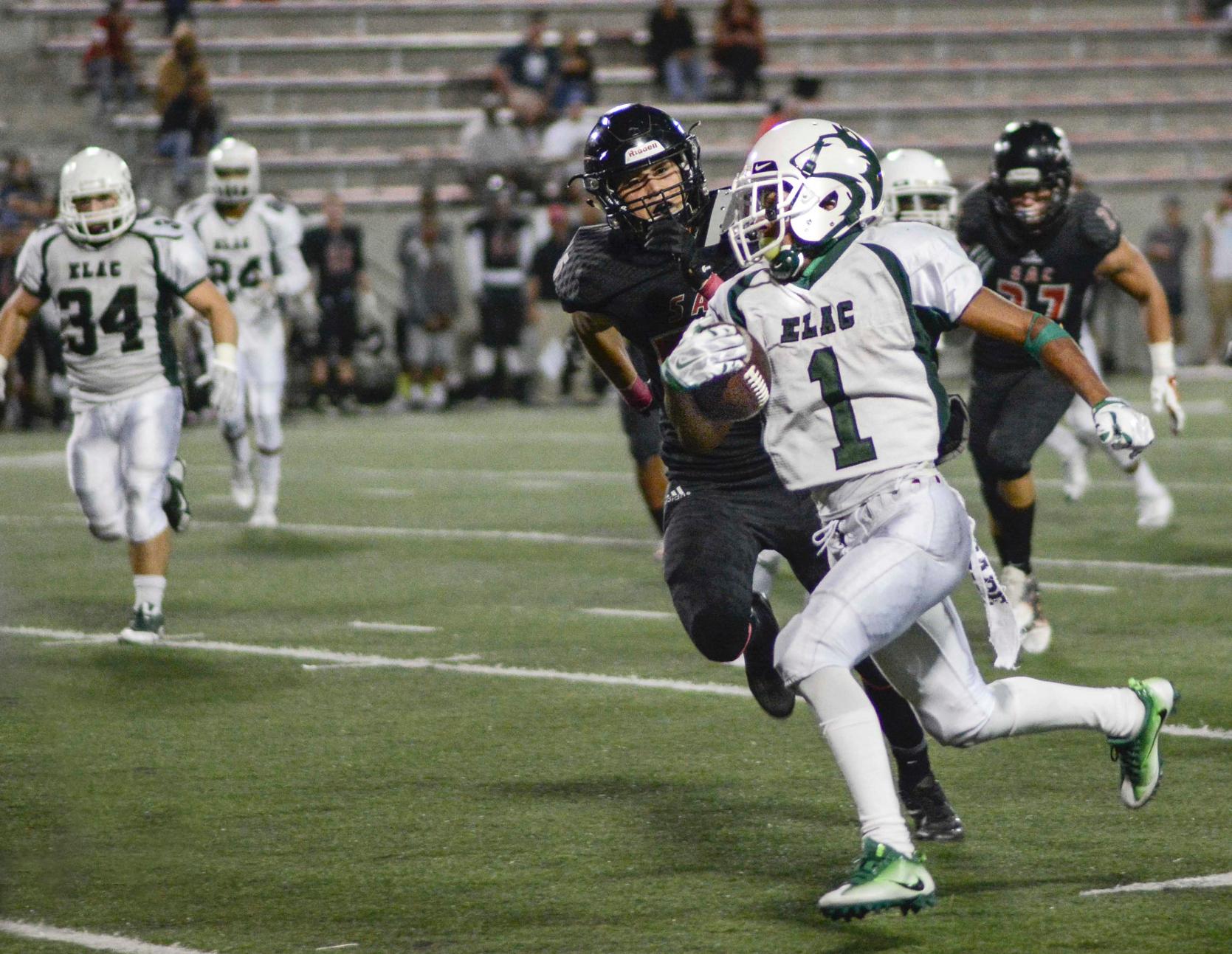 East Los Angeles College wide receiver Cemaj Douglas returns a punt 44 yards for a touchdown in a 26-21 come-from-behind win at Santa Ana College on Oct. 1. (Photo by Tadzio Garcia)