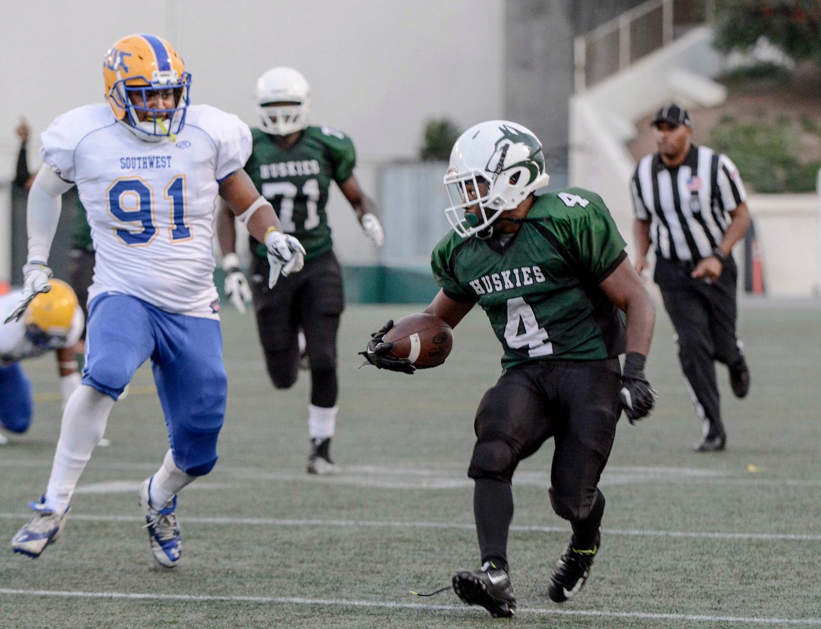 East Los Angeles College sophomore running back Shiloh Jordan runs for a 30 yard gain in a 47-14 Huskies win against LA Southwest College Oct. 15 at Weingart Stadium. (Photo by Tadzio Garcia)