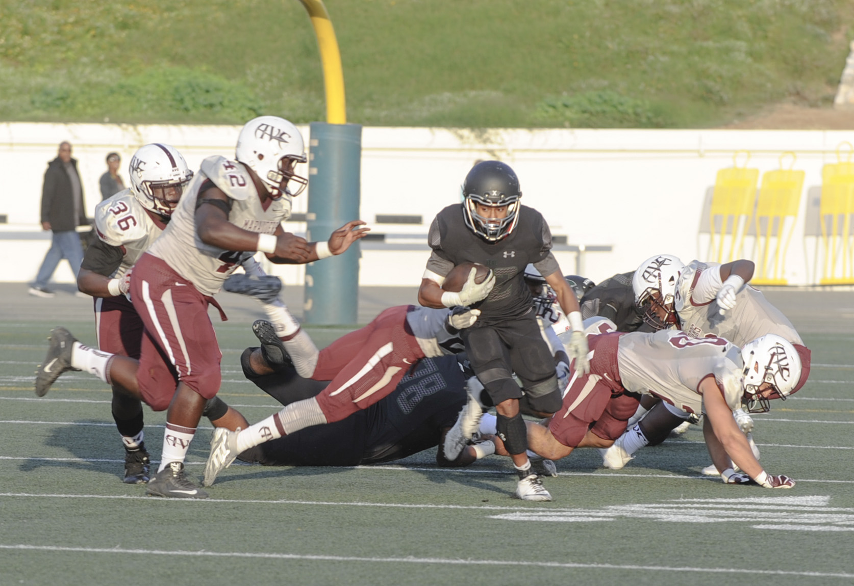 East Los Angeles College football team sophomore running back Marquis Arnold rushes for a big gain up the middle in a 16-14 loss to Antelope Valley College. (Photo by Tadzio Garcia)
