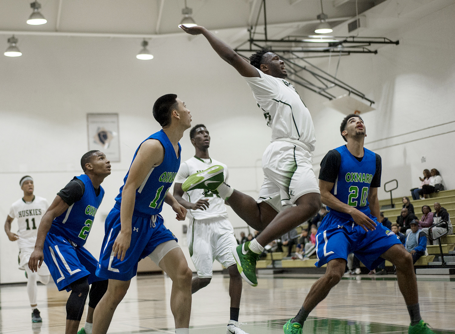 AIR WALKER&mdash;East Los Angeles College freshman guard Sequan Walker comes down for a landing after leaping for a two-point shot in a 99-81 win against Oxnard College. (Photo by Tadzio Garcia)