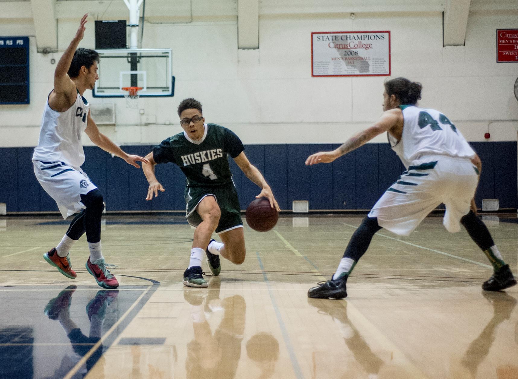 Huskies open tourney with 97-63 win