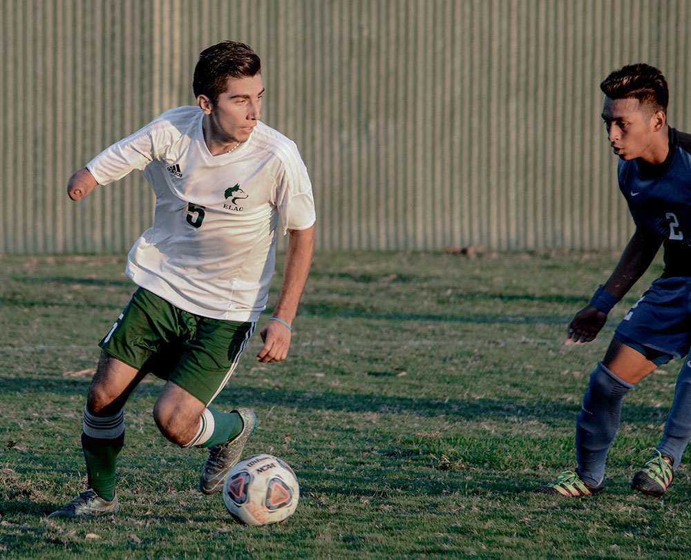 East Los Angeles College sophomore defender Ernesto Rubalcava attempts a pass in a 3-0 loss at Cerritos College on Oct. 25 (Photo by Tadzio Garcia)