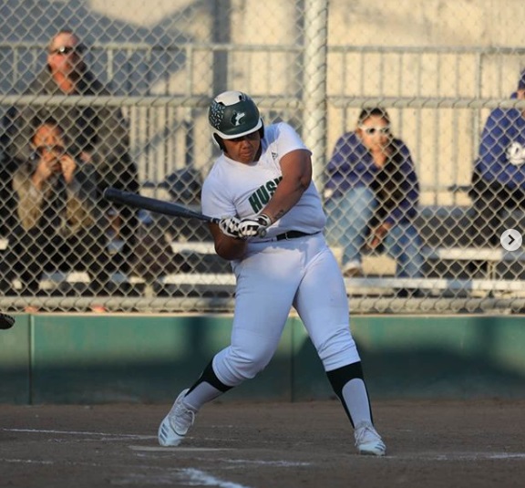 First Baseman Puatausaga Johnson swinging