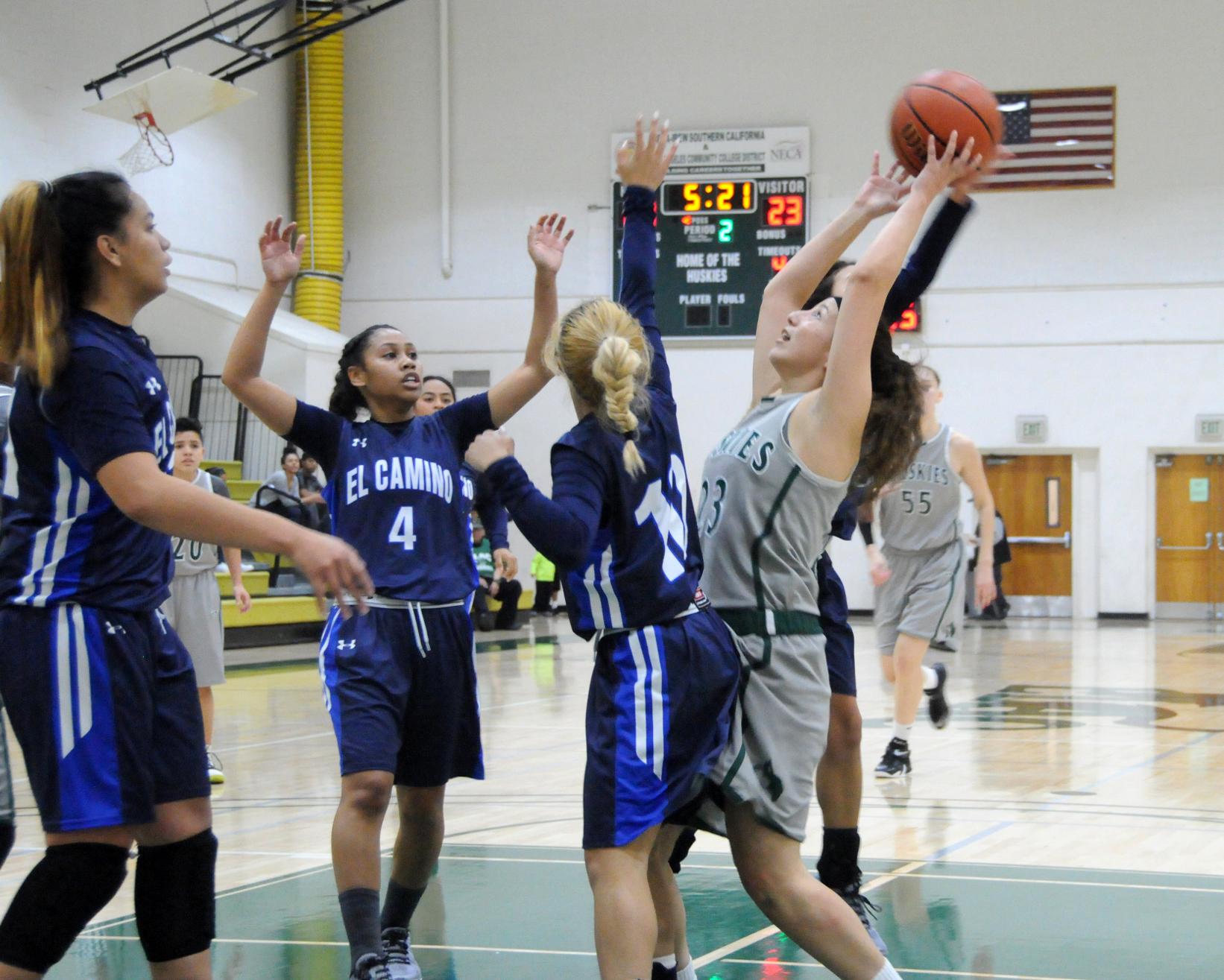 East Los Angeles College sophomore forward Jasmine Leal attempts a shot in the paint with the Huskies leading 28-23 with 5:21 remaining in the first half in a 74-67 win vs. El Camino College. (Photo by DeeDee Jackson)