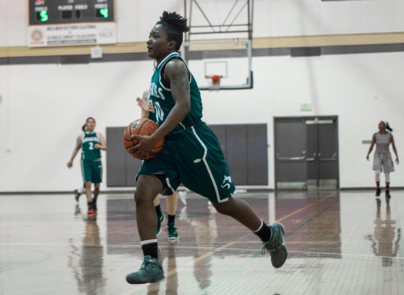 Lady Huskies basketball awaits playoff seed