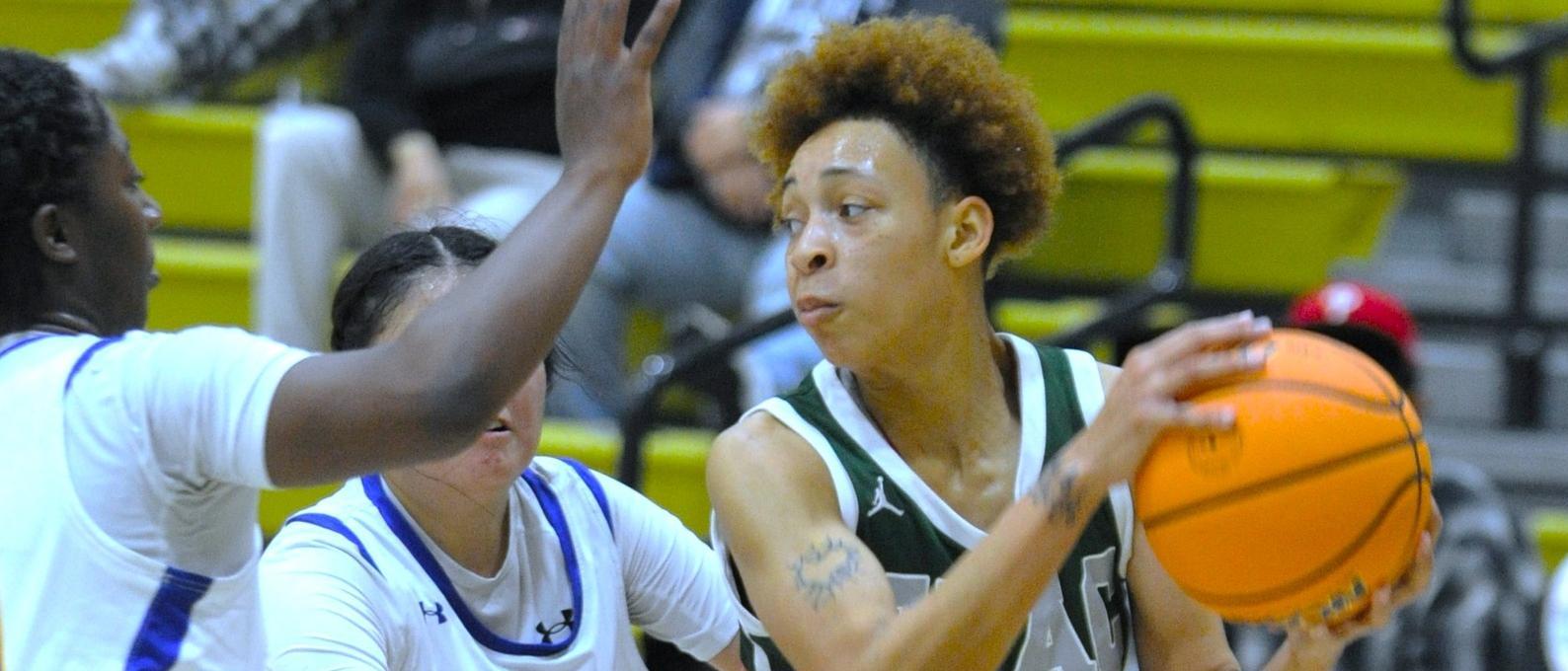 Relentless Rebounding Plus Hot Third Quarter Leads to Easy Pack Win at ECC